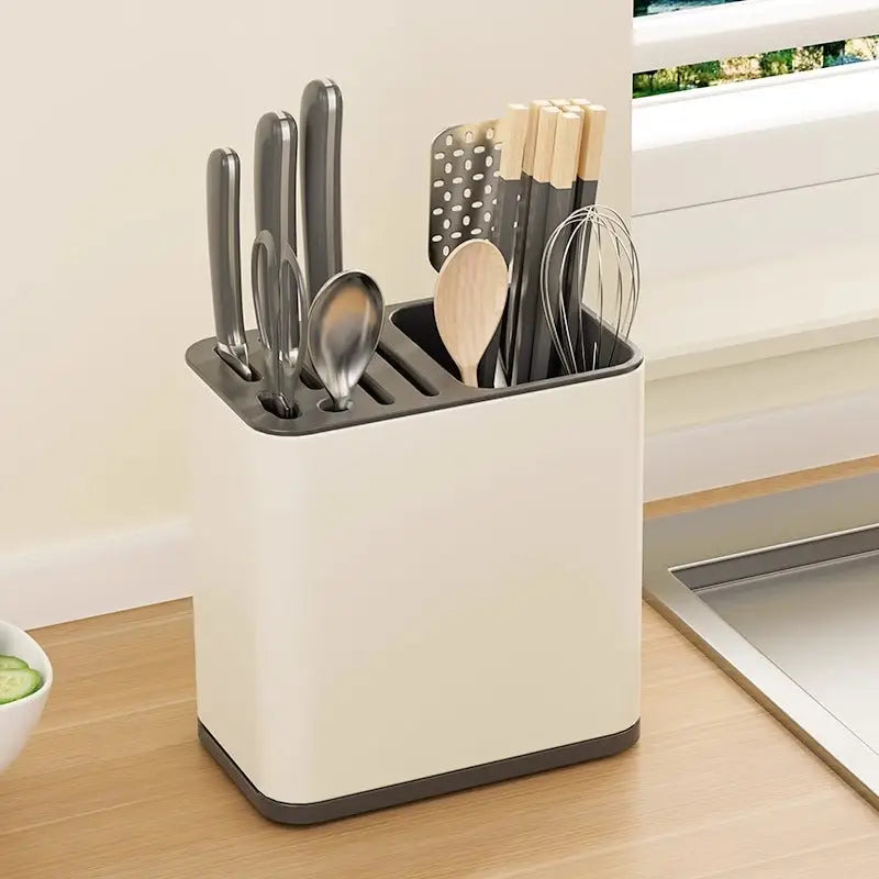 Stainless steel kitchen utensil holder with knives, spoons, and chopsticks for organized kitchen utensils feel