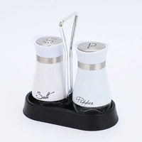 Stainless steel salt and pepper shaker set with black base and silver handle