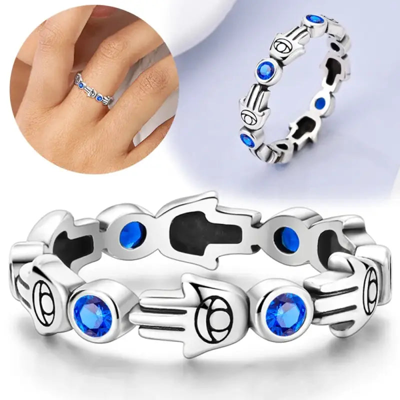 Sterling silver ring with blue stones and Hamsa hand design for spiritual jewelry