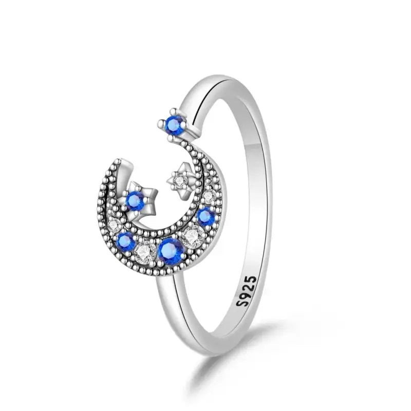 Sterling silver moon and star ring with blue and white stones from Double Layer collection