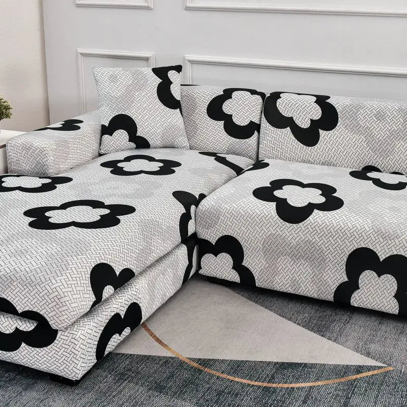 Floral-patterned stretch sofa cover on a sectional sofa for stylish protection