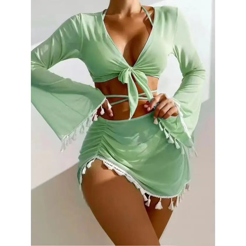 Light green tassel-trimmed swimsuit cover-up.
