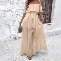 Off-the-shoulder beige maxi dress.