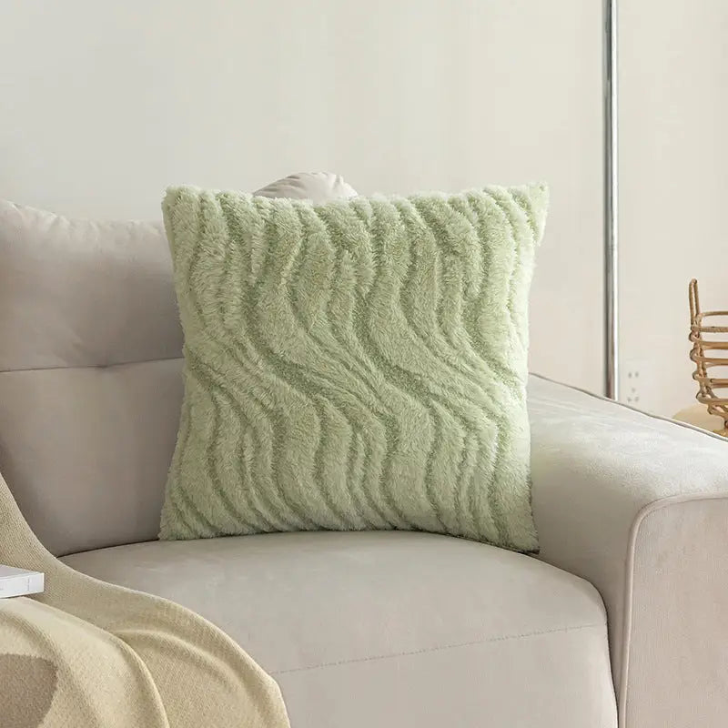 Green faux fur wavy cushion as a playful plush decoration for home decor