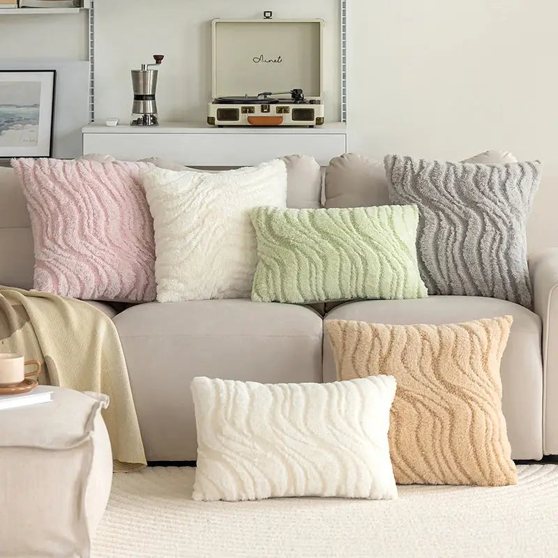 Assortment of textured throw pillows for playful plush decoration and home decor