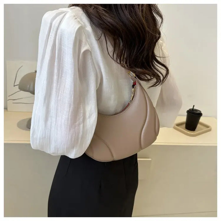 Beige textured trend shoulder bag purse with crescent shape for stylish everyday wear