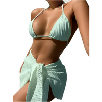 Light green textured bikini and sarong set.