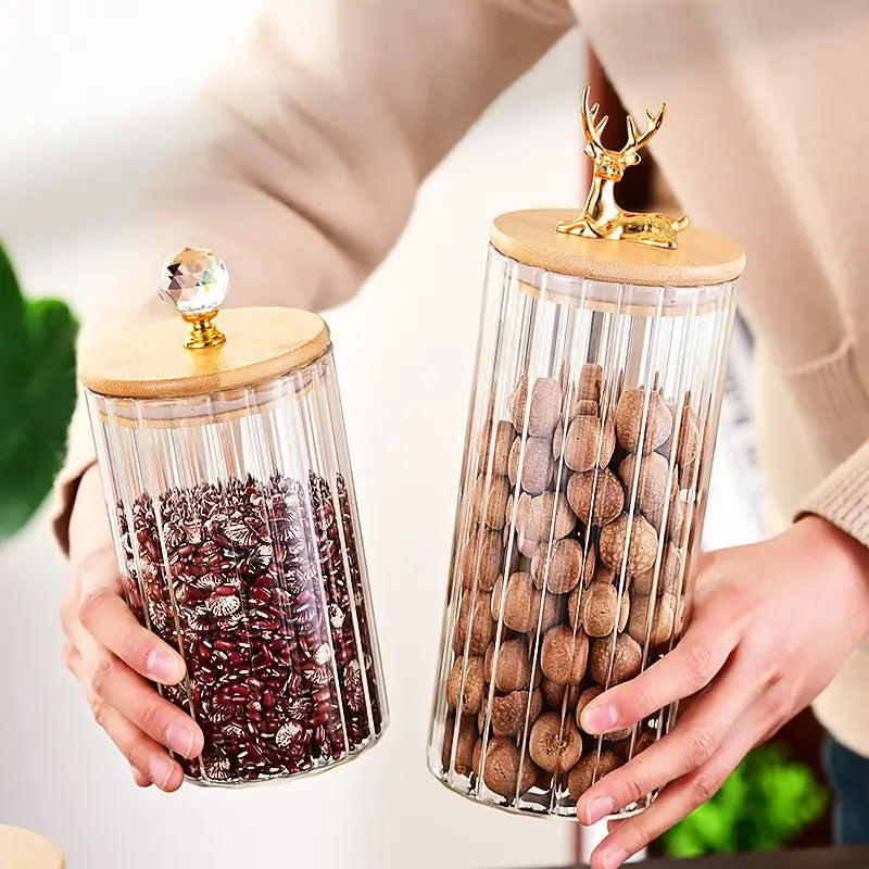 Two transparent glass sealed jars with wooden lids from Sealed Jar Sets for storage