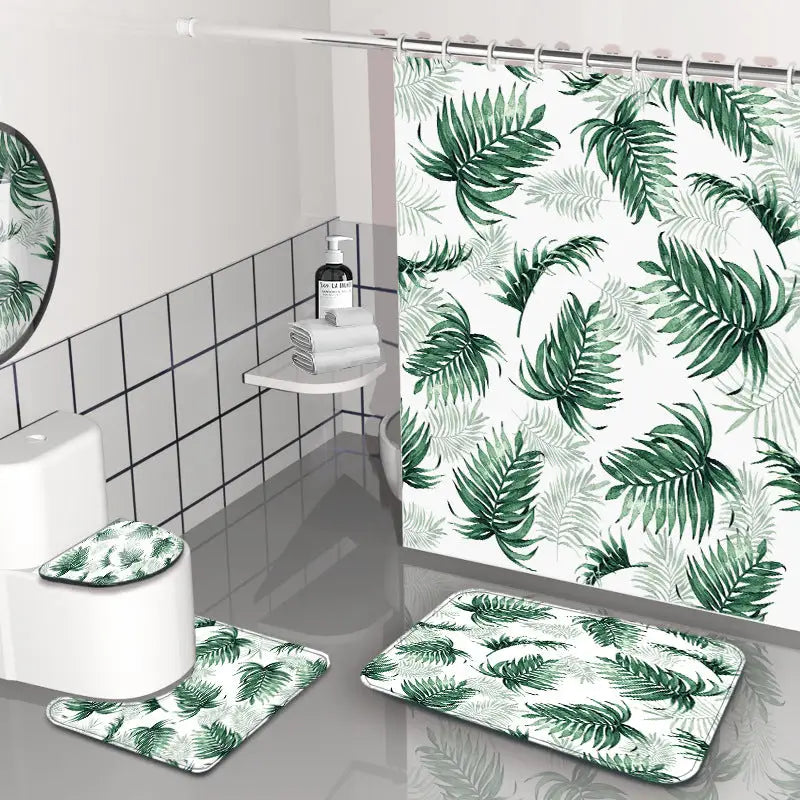 Bathroom set with tropical leaf pattern.
