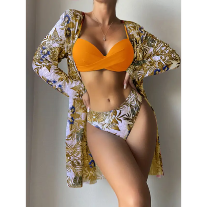 Woman in orange bikini with floral cover-up.