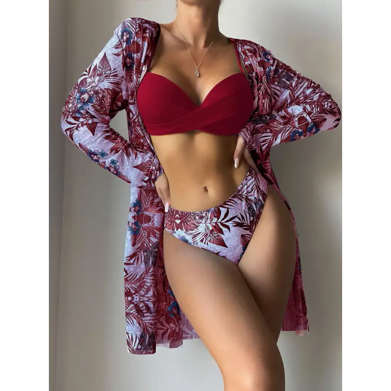 Woman in a red bikini and floral cover-up.