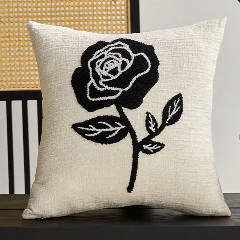 Cream pillow with black rose design for Twisted Strip Sofa Throw Cushion look