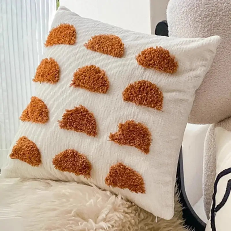 White decorative pillow with orange tufted semicircles, Twisted Strip Sofa Throw Cushion