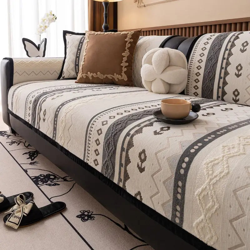 Luxurious cushion cover for couch with patterned design and matching pillows for added style