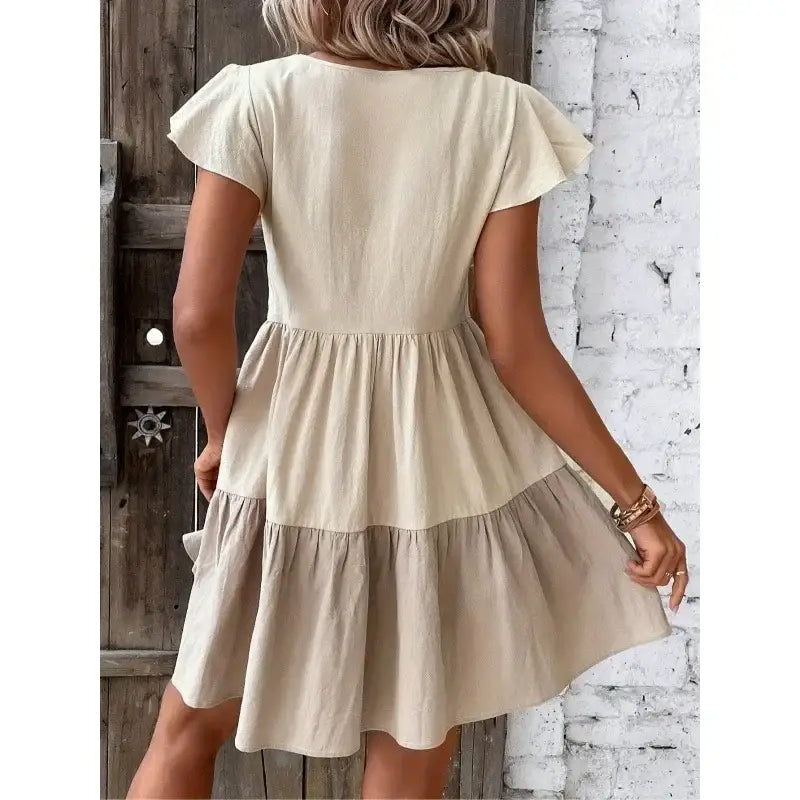 Beige tiered dress.