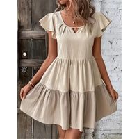 Beige tiered ruffle-sleeve dress.