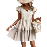 Beige tiered summer dress.