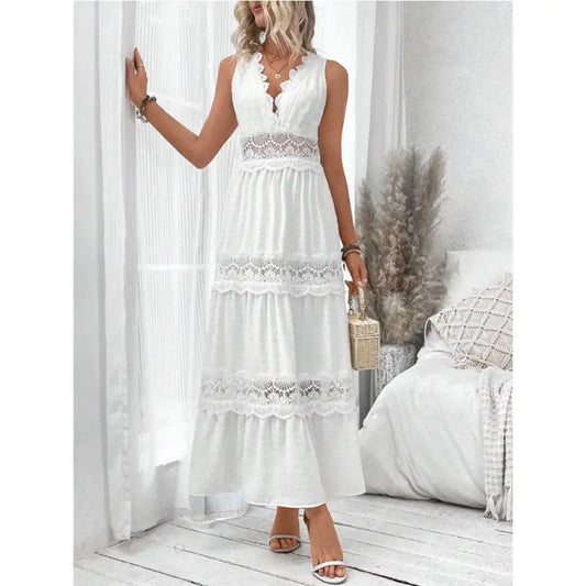 White sleeveless lace-trimmed maxi dress.