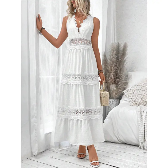 White sleeveless lace-trimmed maxi dress.