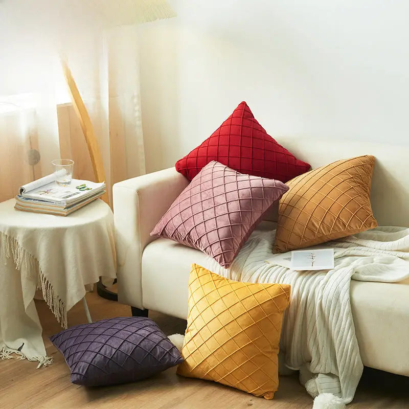 Assorted textured velvet embroidered throw pillows with diamond-shaped lattice design for cozy cushions