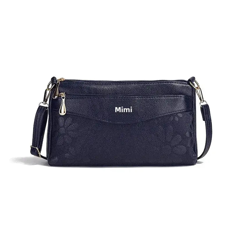 Navy blue floral-patterned handbag.