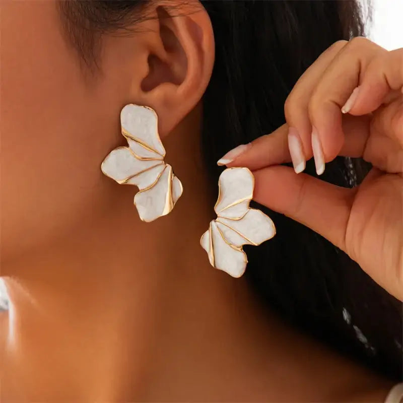 White and gold vintage-inspired half flower stud earrings for elegant accessory style