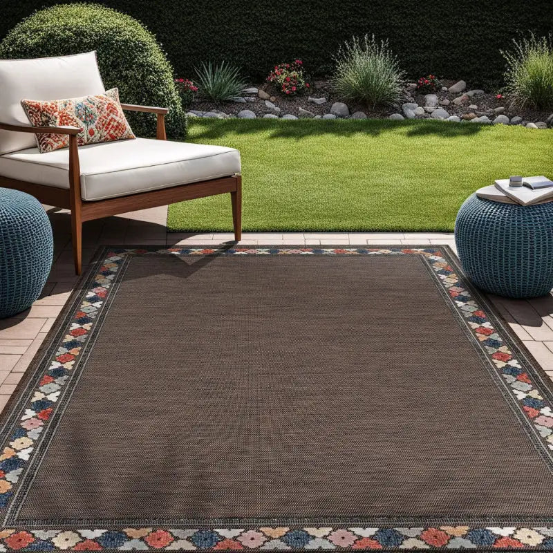 Brown vintage floral outdoor patio mat with patterned border for outdoor spaces