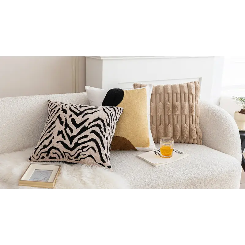 Assorted decorative throw pillows with a Vintage Knotted Cushion design for stylish decor