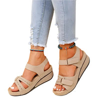 Beige wedge sandals showcasing vintage women’s sandals for stylish, fun vintage women’s looks