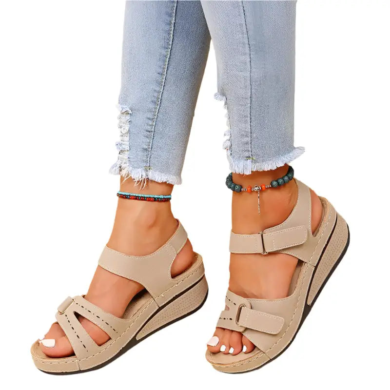 Beige wedge sandals showcasing vintage women’s sandals for stylish, fun vintage women’s looks
