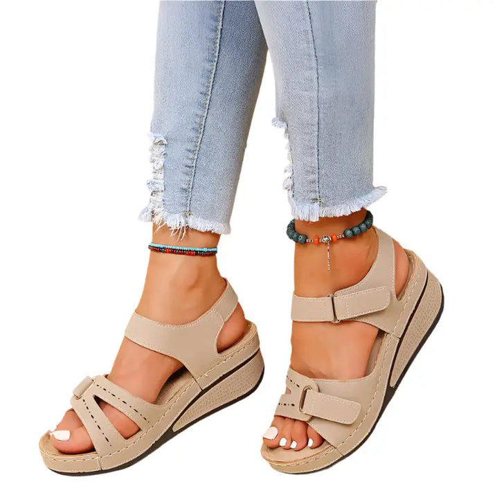 Beige wedge sandals showcasing vintage women’s sandals for stylish, fun vintage women’s looks