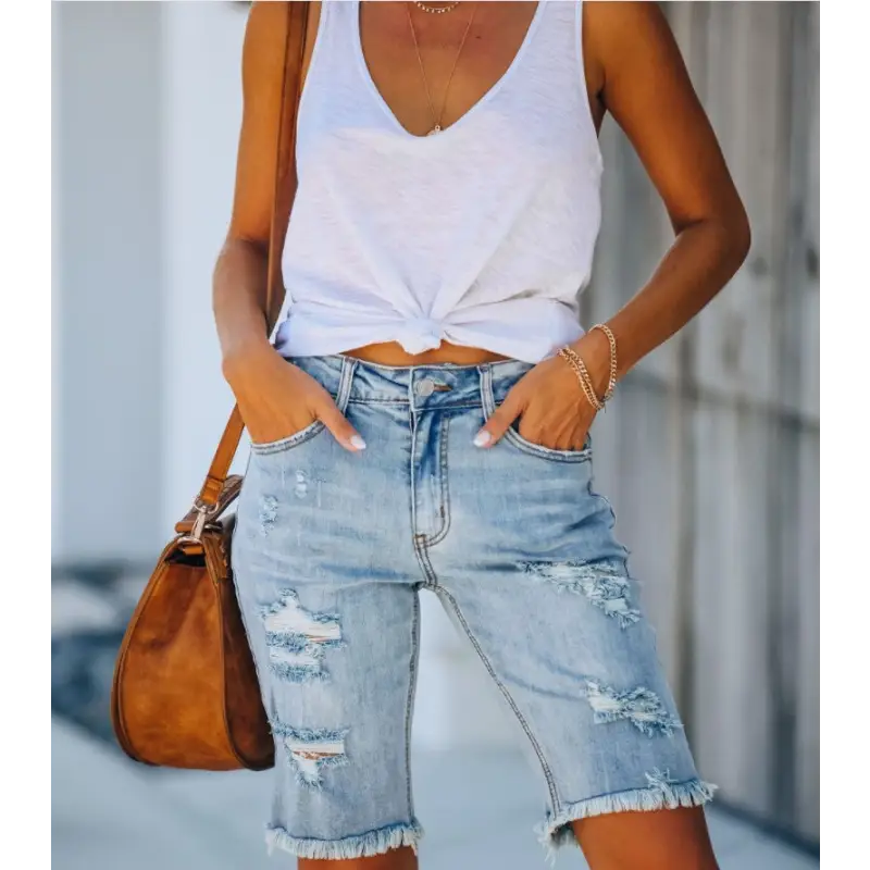Distressed denim Bermuda shorts.