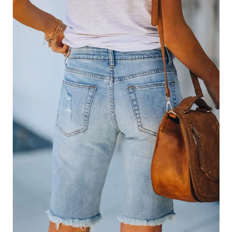 Frayed denim shorts.