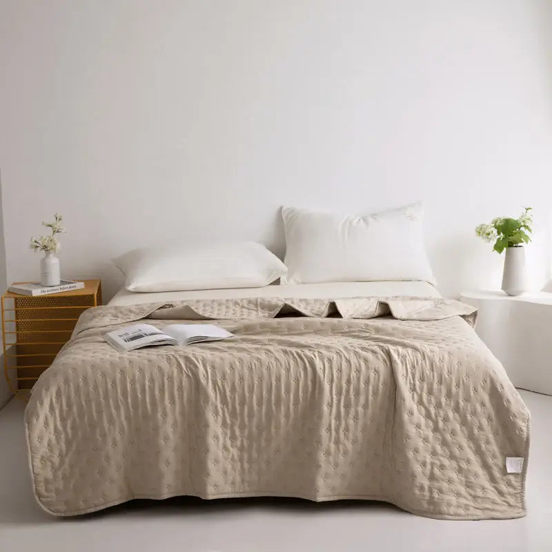 Beige textured bedspread.