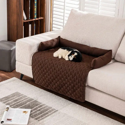 Brown quilted waterproof pet mat with bolster for dogs and cats on the sofa