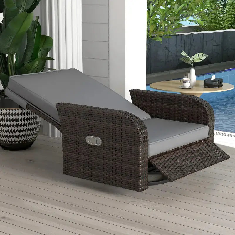 Wicker swivel chair with gray cushions for outdoor lounging featuring a wicker swivel design