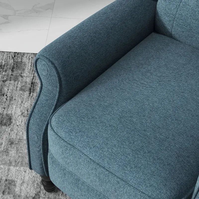 Blue upholstered wingback reclining chair for stylish relaxation and comfort