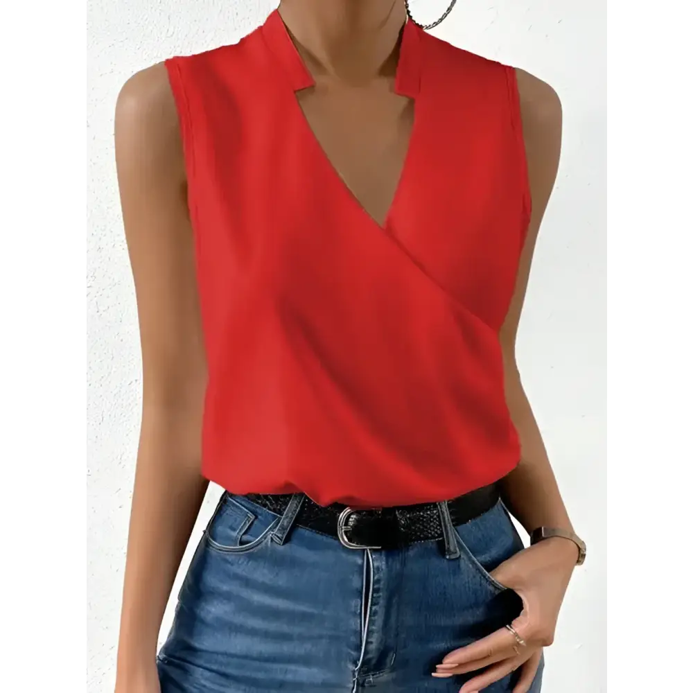 Red sleeveless blouse.