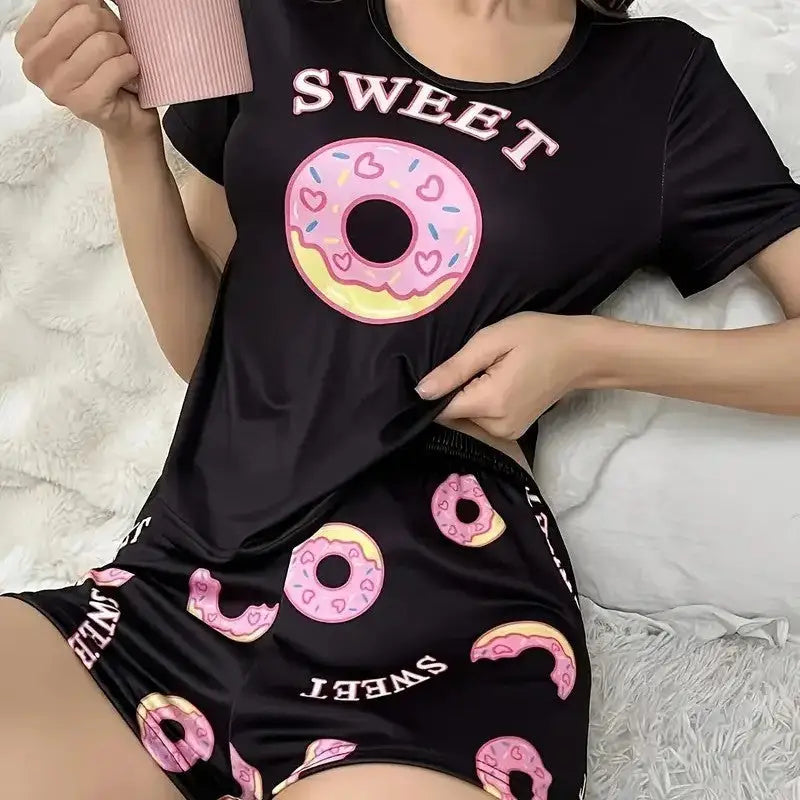 Black pajama set with donut pattern.
