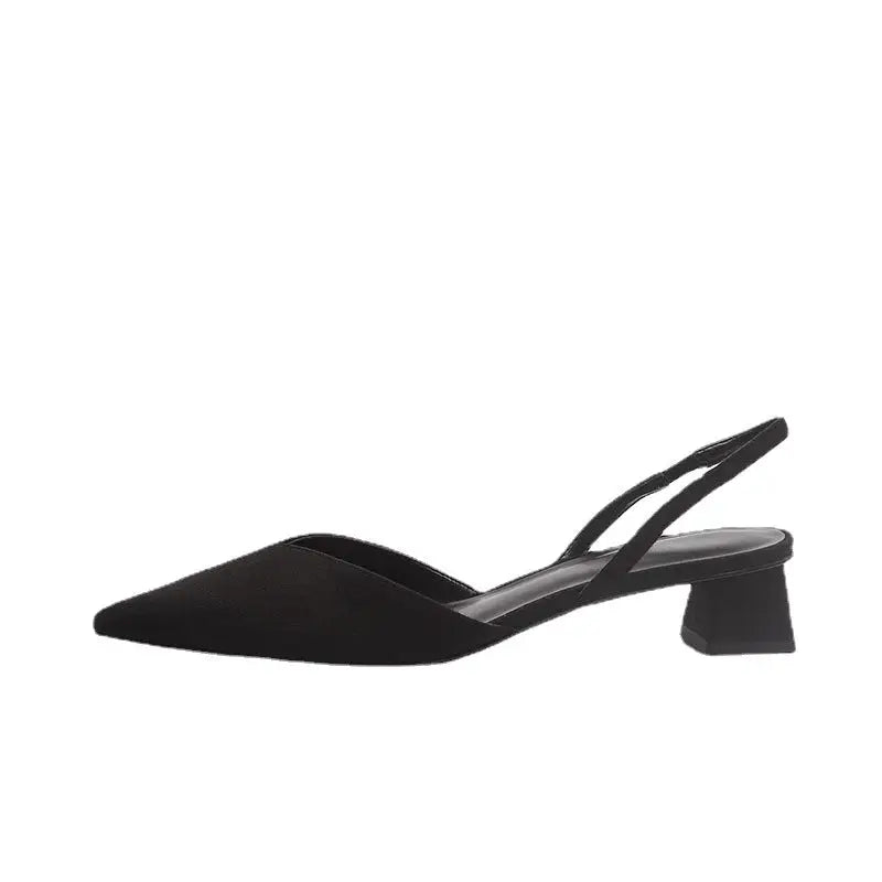 Black pointed-toe slingback heel.