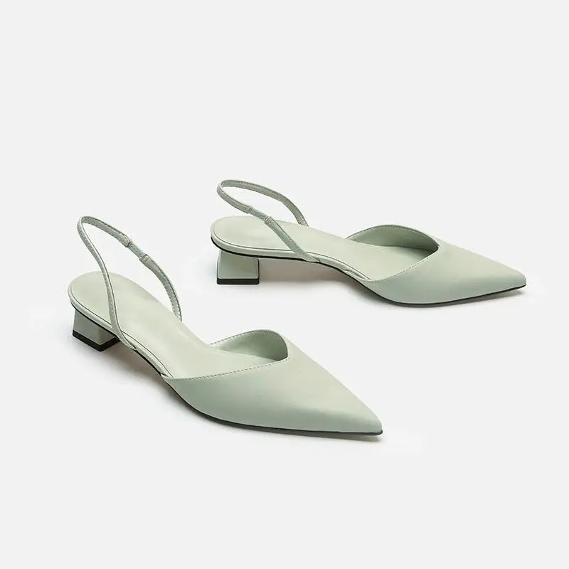 Pair of light green slingback heels.