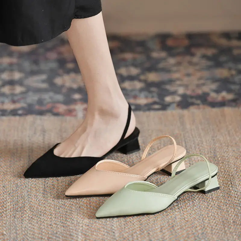 Pointed-toe slingback heels.