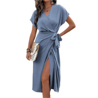 Blue wrap dress with a side slit.