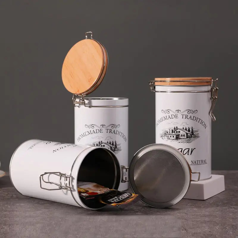 White kitchen canisters with wooden lids featured in wrought iron sealed canisters collection